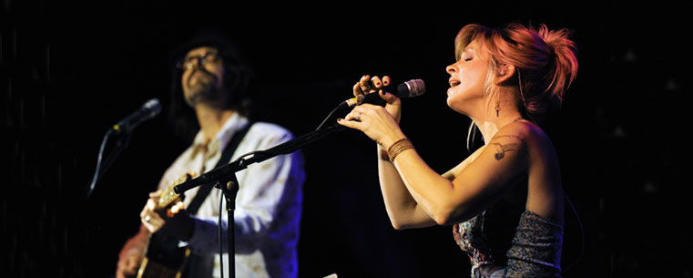 <p>Karin Bergquist, lead singer for Over the Rhine, performs with Linford Detweiler during a concert at the Kent Stage, as part of the 2012 Kent State Folk Festival.</p>