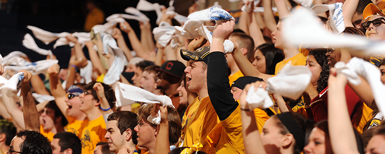 Kent State fans in the student section of the Memorial Athletic and Convocation Center cheer on the team during a home win.