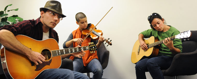 Performers gather for an informal jam session in the Kent Student Center during the 2011 Kent State Folk Festival workshops.