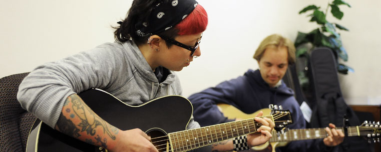 Performers gather for an informal jam session in the Kent Student Center during the 2011 Kent State Folk Festival workshops.