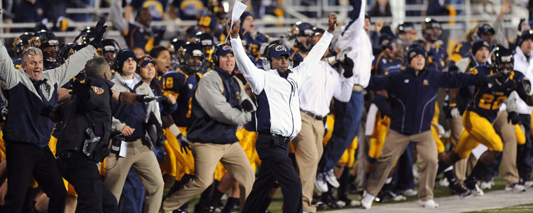 Head Coach Darell Hazell and the Kent State football team reacts to a last-second win, following a Central Michigan missed field goal attempt at Dix Stadium.