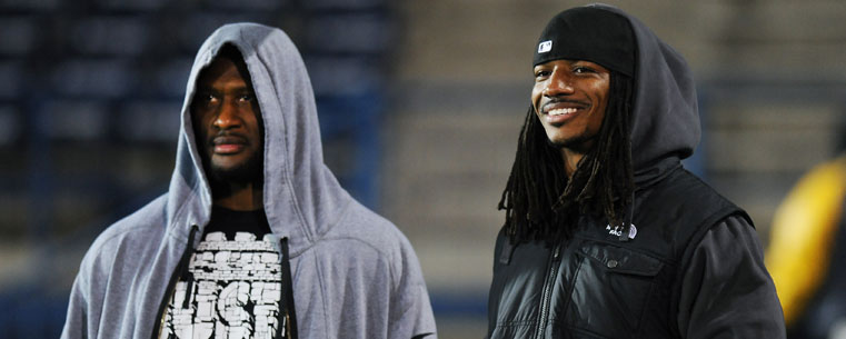 Former Golden Flashes and current Cleveland Browns defensive back Usama Young (right) and Pittsburgh Steelers linebacker James Harrison visited Dix Stadium to witness Kent State's 24-21 win over Central Michigan.