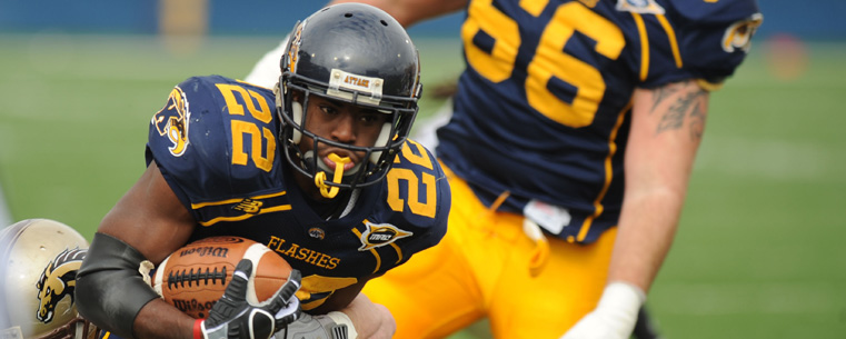 Jacquise Terry, a Kent State running back, gains yards against Coastal Carolina during the 2009 season.