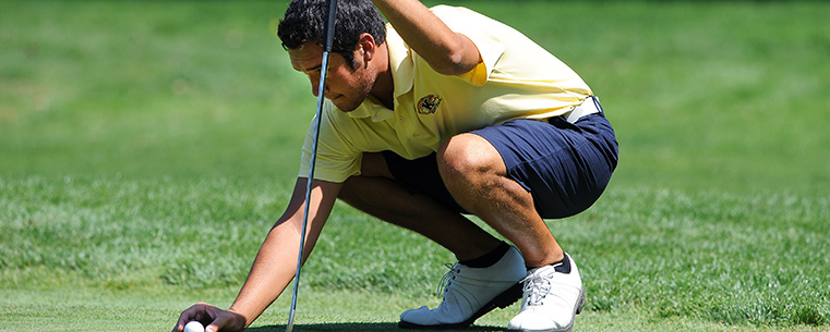 Kent State golfer Nick Scott lines up a putt during the 2013 season.