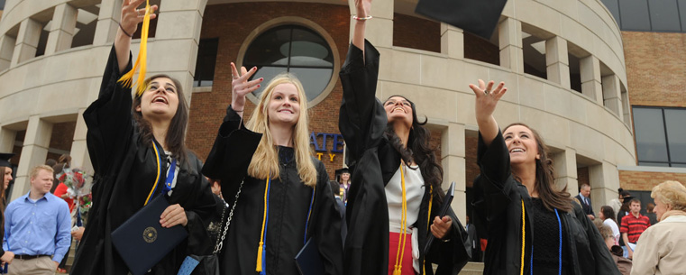 <p>New Kent State graduates celebrate after the University's morning commencement ceremony on May 11, 2013.<br />
</p>