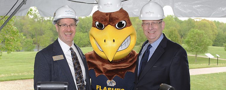 Kent State University at Stark Dean Walter F. Wagor (left) poses for photos with Kent State’s mascot, Flash, and Kent State University President Lester A. Lefton during the groundbreaking ceremony for the new Sciences Building at Kent State Stark.