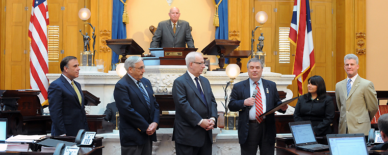 <p>From the floor of the Ohio Senate, Sen. Tom Sawyer presents a resolution to Kent State University President Lester A. Lefton honoring the university's centennial.</p>