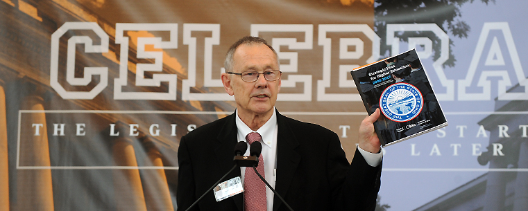 <p>Ohio Board of Regents Vice Chancellor John Brighton speaks during the Kent State University/Bowling Green State University centennial event in Columbus.</p>