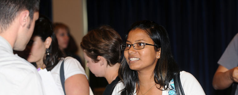 <p>Students mingle during the Graduate Resource Fair, in the Student Center Ballroom.</p>