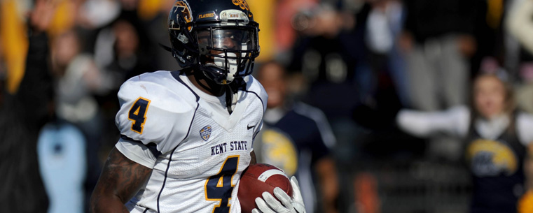 Kent State senior wide receiver Eric Adeyemi (4) runs to the endzone to score a touchdown against Bowling Green. Kent State beat Bowling Green in a 31-24 victory over Bowling Green at Doyt Stadium, in Bowling Green, OH on Saturday, Nov. 17. The Flashes victory over Bowling Green brings the Flashes one step closer to clinching the MAC title. (photo courtesy of Kristin Bauer, The Record-Courier)