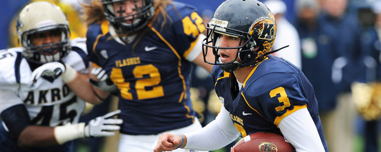 Kent State quarterback Spencer Keith runs in for a 4-yard touchdown, during the Golden Flashes 35-24 victory over the University of Akron.