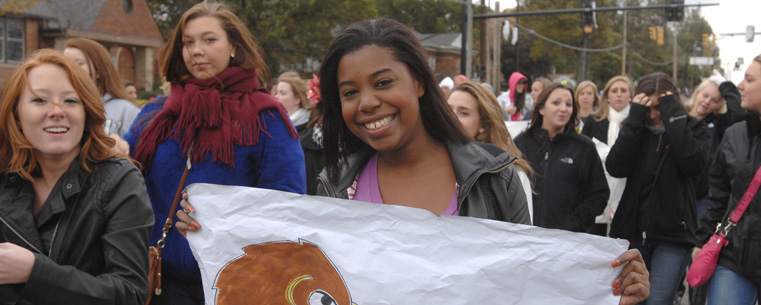 Students march in the 2011 Homecoming Parade.