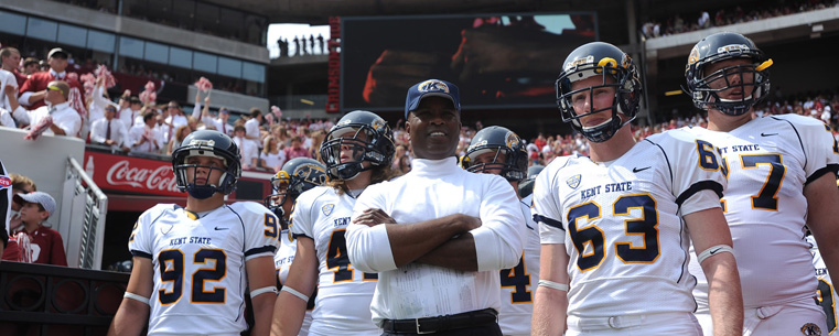 <p>Coach Hazell prepares to lead the team out onto the field.</p>