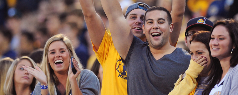 <p>Kent State fans cheer on the team.</p>