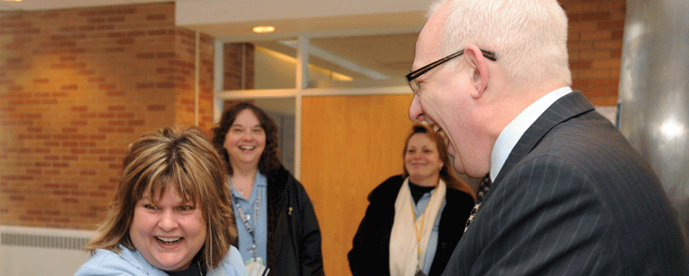 Kent State University President Lester A. Lefton congratulates Lisa A. Ferrell, housekeeping supervisor in residence services, who received the President’s Excellence Award. Kent State has been named one of the 2011 “Great Colleges to Work For.”