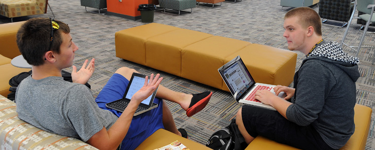 <p>Kent State students gather in the “Fab Fourth,” a new area on the fourth floor of the University Library designed for students. The “Fab Fourth” includes UCommute, a new center for commuter services, and the Writing Commons, the university’s writing center.</p>