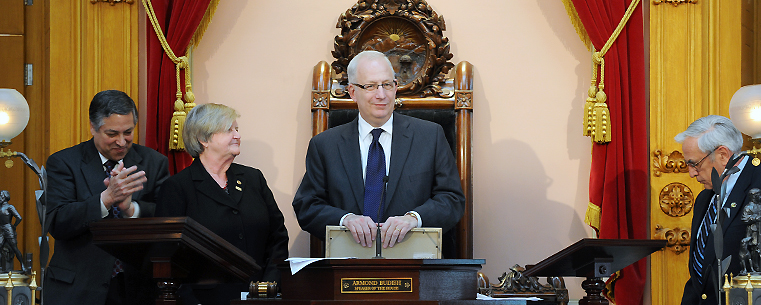 <p>Kent State University President Lester A. Lefton accepts a resolution recognizing Kent State's centennial anniversary from the Ohio House of Representatives.</p>