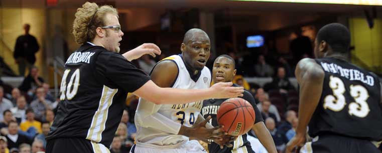 <p>Kent State forward Justin Greene loses the handle during a drive to the basket in Kent State's win over Western Michigan, 76-72, in the quarterfinal game of the Mid-American Conference Tournament in Cleveland.<br />
</p>