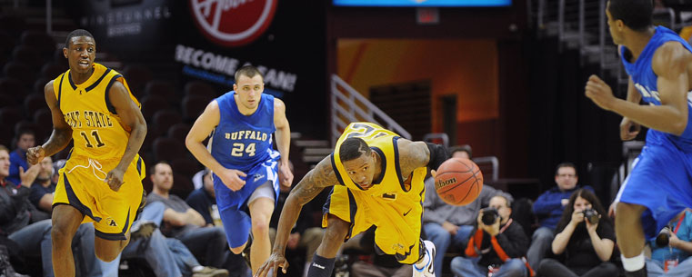 Kent State player Scooter Johnson makes a fast break down court after intercepting a Buffalo pass during a win last season.