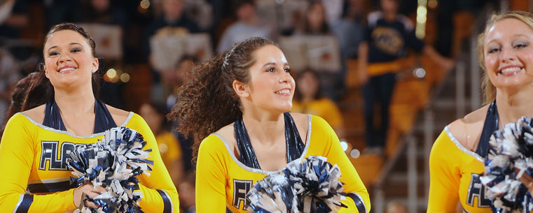 The Kent State Dance Team entertains the home crowd in the MAC Center during a home game.