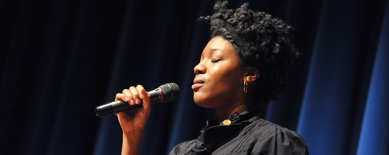 <p>Michaela Write, a Kent State student, performs in the Kent Student Center Kiva during the university’s 10th annual Martin Luther King Jr. Celebration.</p>