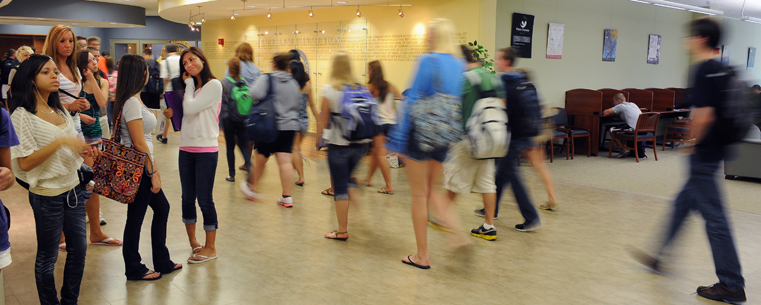 <p>Kent State students head into the new Math Emporium, located on the second floor of the University Library, for a new class session.</p>