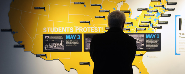 A visitor to the new Kent State May 4 Visitors Center views one of the many displays detailing the events surrounding May 4, 1970. An open house was held as part of Homecoming activities.