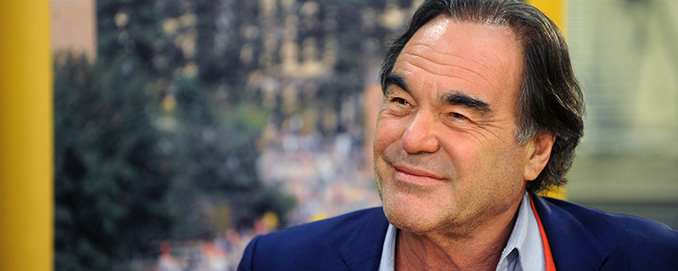 Film director and producer Oliver Stone reacts to a question from the media during a press conference in Taylor Hall.