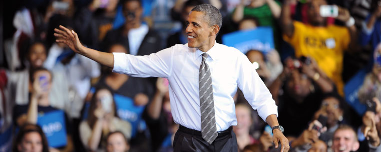 President Barack Obama waves to well-wishers in the MAC Center as he arrives for a speech Wednesday evening.