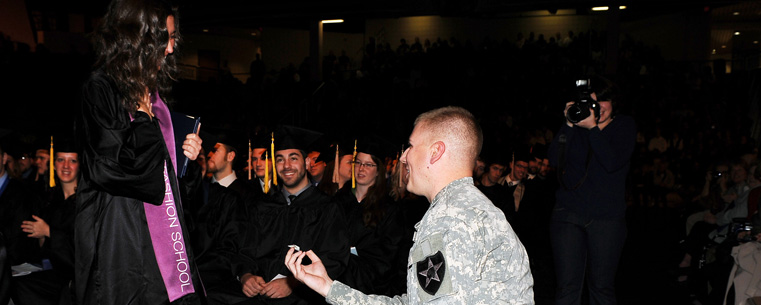 <p>A graduate in Fashion Merchandising is surprised by her boyfriend as he proposes to her at the commencement ceremony.</p>