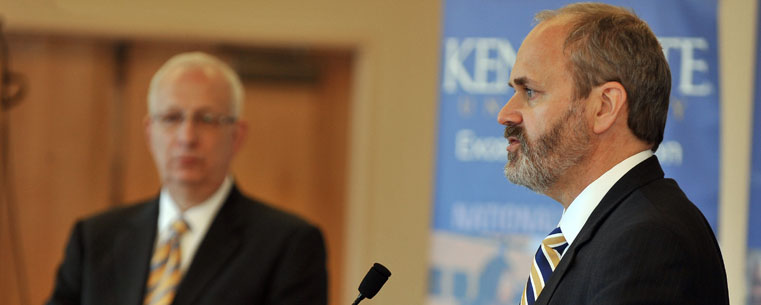 With Kent State University President Lester A. Lefton in the background, Dr. Todd Diacon answers questions during a press conference introducing him as the university's new senior vice president for academic affairs and provost.