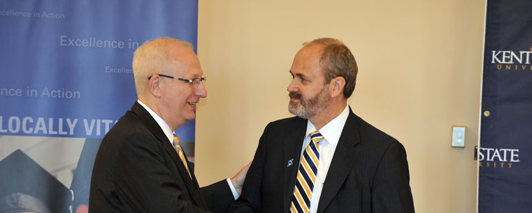 Kent State University President Lester A. Lefton shakes hands with Dr. Todd Diaconfollowing Lefton's announcement that Diacon has been named the university's new senior vice president for academic affairs and provost.