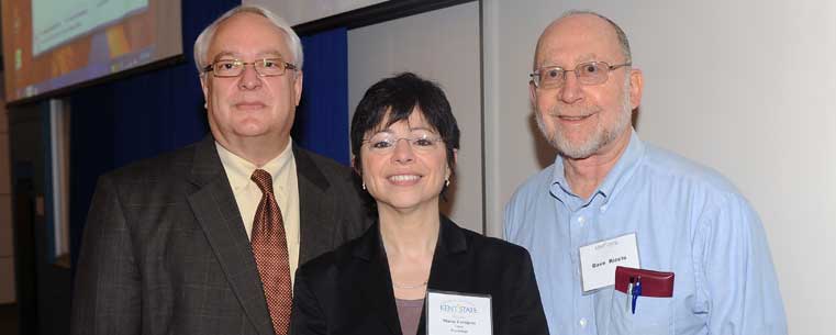 Dean of the College of Arts and Sciences, Timothy S. Moerland, was on hand at the scientific meetings with Maria Zaragoza, professor and chair of Kent State's Department of Psychology, to celebrate Professor David Riccio's many contributions to Kent State.