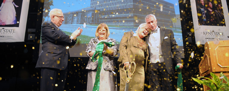 <p>President Lester A. Lefton, Cynthia Stillings and John Crawford (right) congratulate benefactor Roe Green after the official ribbon-cutting for the Roe Green Center for the School of Theatre and Dance.</p>