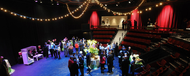 <p>Guests attending the reception for the grand opening of the Roe Green Center for the School of Theatre and Dance gather in the Wright-Curtis Theatre.</p>