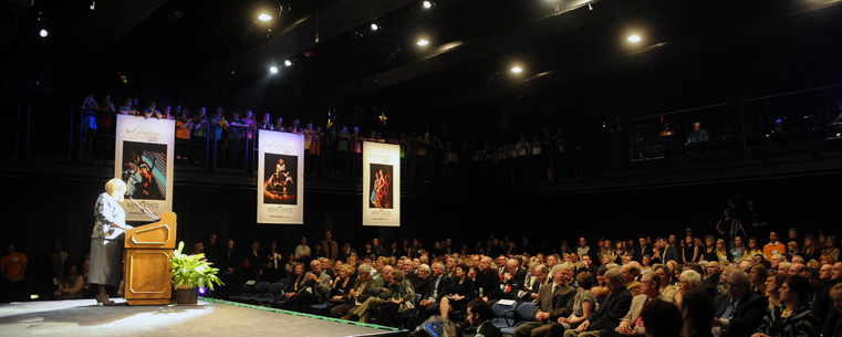 <p>Cynthia Stillings, director for the School of Theatre and Dance, addresses those attending the grand opening of the Roe Green Center.</p>