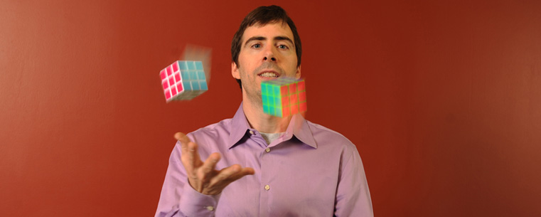 Dr. Morley Davidson juggles three Rubik's Cubes. A global phenomenon and an icon of the 1980s, the Rubik's Cube is one of the world's most popular and addicting puzzles.