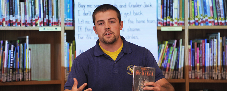 A Kent State student in youth services librarianship delivers a presentation in the Reinberger Children’s Library Center, one of the unique teaching facilities in the School of Library and Information Science at Kent State.