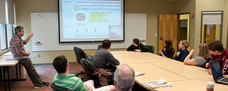 Students in Kent State's School of Digital Sciences listen attentively during a classroom lecture.