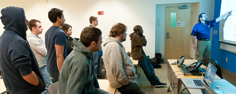 Students in Kent State's School of Digital Sciences listen attentively during a classroom lecture.