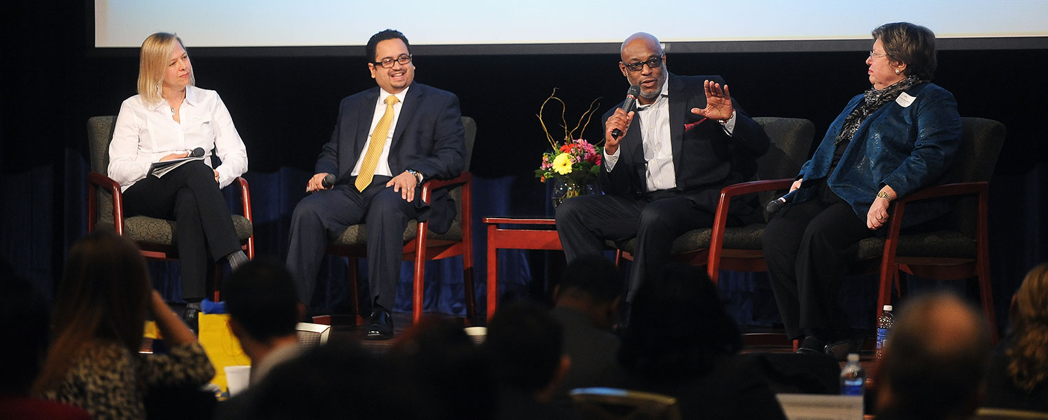 Panel members discuss ways of encouraging young people to attend college during the See You @ College conference in the Kent Student Center Ballroom. Pictured are (from left to right) Carol LaSpina, parent; Victor Ruiz, executive director of Esperanza Inc.; Kwame Scruggs, Ph.D., founder of Alchemy Inc.; and Carol Rivchun, president of Youth Opportunities Unlimited.