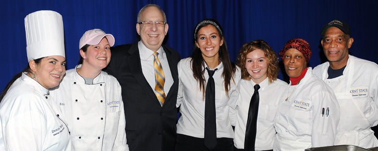 <p>President Lefton gathers with members of the Dining Services during the Flashes Forever celebration.</p>