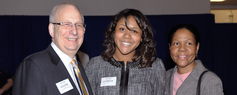 <p>President Lefton enjoys the celebration with graduates and family members at the Flashes Forever event.</p>