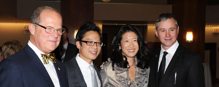 Steinway and Sons President Ron Losby (right), Kent State music professors Donna Lee and Jerry Wong, and Ted Good, president of Steinway Hall (left), during the reception for the All-Steinway designation, in Cartwright Hall.