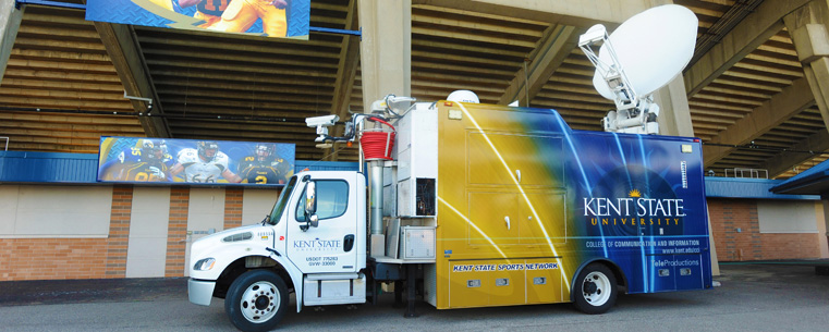 TeleProductions' new satellite truck parked at Dix Stadium. The truck can broadcast live events using many separate cameras.