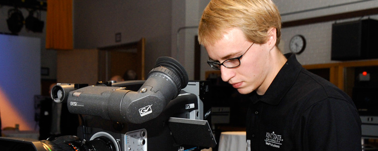 A TeleProductions staff member uses one of the video cameras inside a studio in the Music and Speech Center.