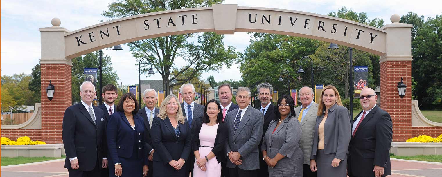 Members of the Kent State University Board of Trustees, along with Kent State President Lester A. Lefton (back row, far left) and Kent State Vice President and University Secretary Charlene Reed (front row, second from left), pose for a group photo on the Kent State University Esplanade during the day of their September 2013 board meeting.