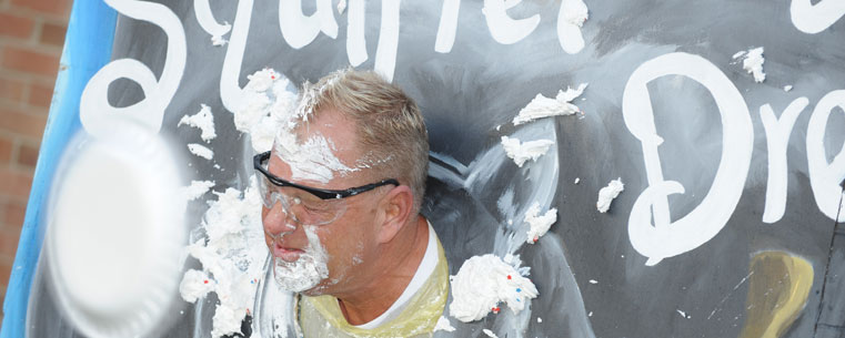 Chuck Berry, assistant director of Dining Services at Kent State, takes a pie in the face during a United Way fundraiser behind the Kent Student Center last fall. The university's 2011-2012 campaign is currently underway.