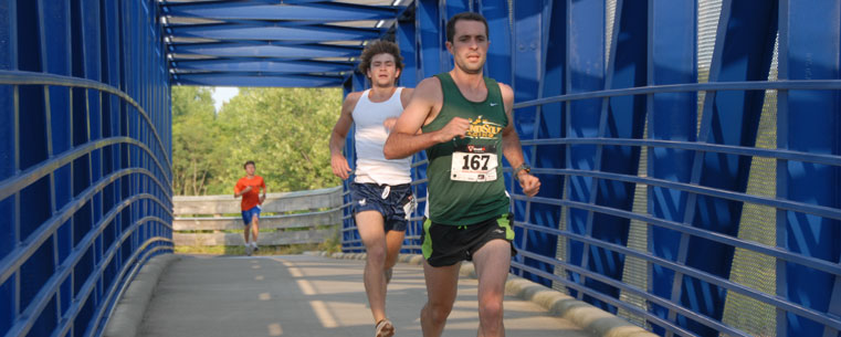 Runners compete in the United Way 5K run held on campus in July.Kent State University's 2011-2012 United Way campaign, carrying the theme "Shared Passion: Giving Where We Live and Work," is underway through Dec. 2.