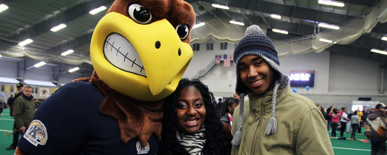 <p>Upward Bound high school students pose with Flash, the Kent State mascot, at a lunch at the Kent State Field House.<br />
<br />
</p>